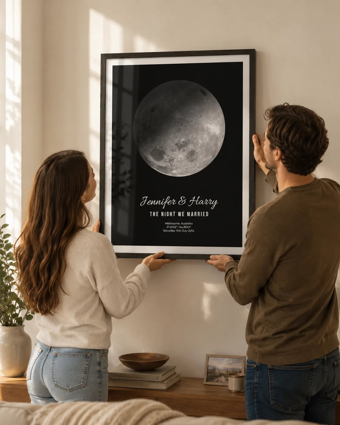 Framed moon phase print styled with plants