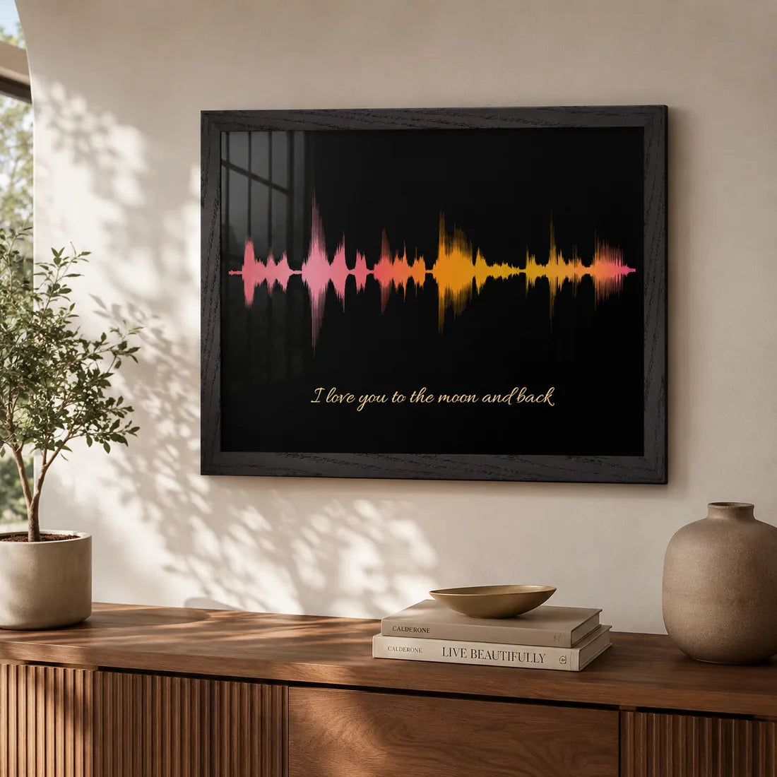 Framed voice print soundwave on a shelf